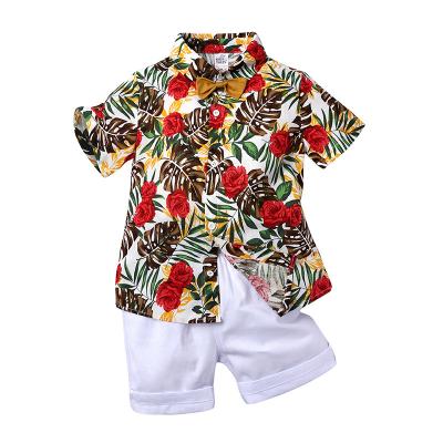 China Hot Selling Summer Boys Casual Factory Spring And Leaf Print Shorts Set Beach Holiday Short Sleeve Shorts Two Piece Set for sale