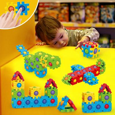 China Smart Building Toy 24PCS Bag Pack Kids DIY Contruction Brick Toys Set Simple Dimple Sensory Pop Fidget Building Block for sale