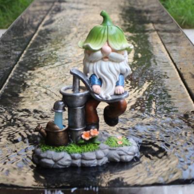 China New Design Europe Figurines Garden Gnome Statue Garden Decoration Dwarf Pulling Water Resin Opens Yard Decor For Kids Gift for sale