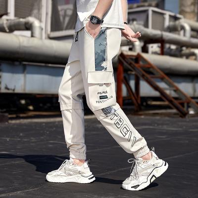 China Spring and Autumn Overalls Men's Function Fire Pants Men's Waterproof Loose Casual Fashion, Handsome and Superb for sale