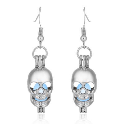 China CLASSIC hollow hollow drop skull women Halloween jewelry luminous earrings wholesale for sale