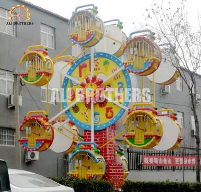 China Uhr-Art-Kinder-Riesenrad-Fahrt 5kw fertigte Farbe 4 M * 6 m-Bereich besonders an zu verkaufen