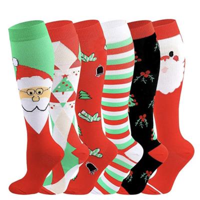 China Wholesale Anti-Fault Women Running Funny Knee High Santa Claus Compression Christmas Socks for sale