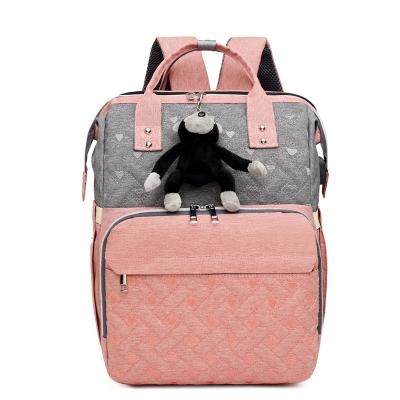 China The Other New Mummy Bag Autumn Folding Crib Going Out Large Capacity Mother and Baby Bag Multifunctional Backpack for sale