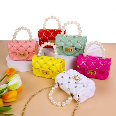 China ENGLAND STYLE Genuine Diamonds Women's Winter Mini Messenger Bags Shoulder Bag Lock Chain Handle Jelly Bag for sale