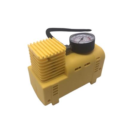 China Yellow Mini Car Air Inflator 12V Car Tire Inflation Tire Pump Portable Compressor Pump Yellow Air Compressor for sale