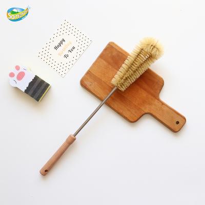 China OEM Sustainable Natural Pot Scrubbing Cuticle Cleaning Oil Long Bottle With Brush Shaft for sale