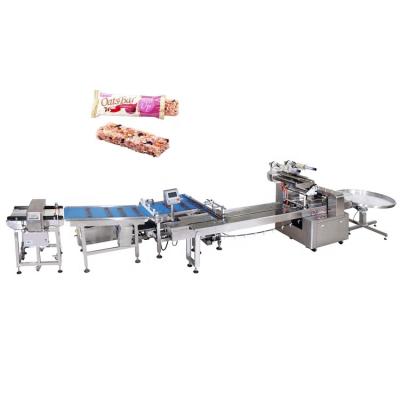 China Automatic Food Flow Wrapping Line Cookies Chocolate Chikki Bar Packing Machine for sale