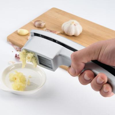 China Amazon Garlic Press Stainless Steel Garlic Presses Tool Zinc Alloy 2021 Sustainable Tending Ginger Crusher for sale