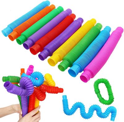 China Educational Construction Building Colorful Heavy Duty Educational Toys Pop Up Tube Busy Person Sensory Toy for sale