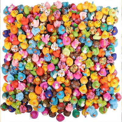 China Bath Toy Promotional Wholesale Plastic Multicolor Floating Bath Toy Rubber Ducks for sale