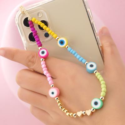 China Cute Bohemian Eye Women Jewelry Fruit Charm Evil Cute Mobile Phone Straps Miyuki Beads Phone Strap Acrylic for sale