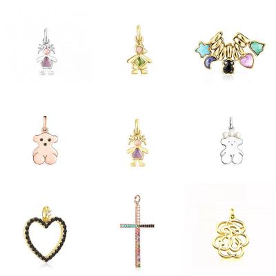 China Cute Rose Gold Silver Vertical Cross Pendant With Gems And Bowknot Of Girl Bear Pendant Jewelry In Spain for sale