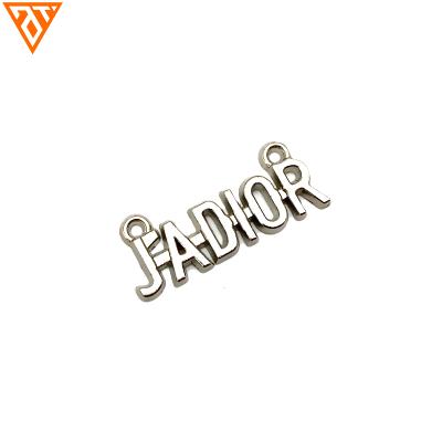 China Viable Custom Design Handbag Logo Plate Metal Brand Label Tag For Clothing for sale