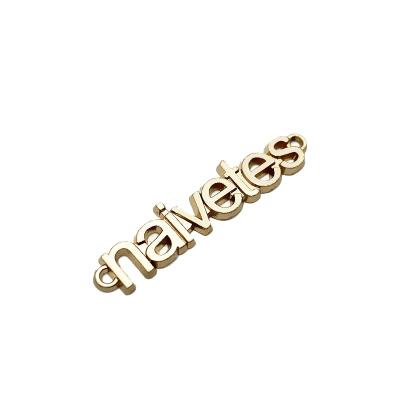 China Durable Gold Color Metal Labels Engrave Concave Name Tag Metal Plates For Handbags Brand Logo Custom Metal Tags for sale