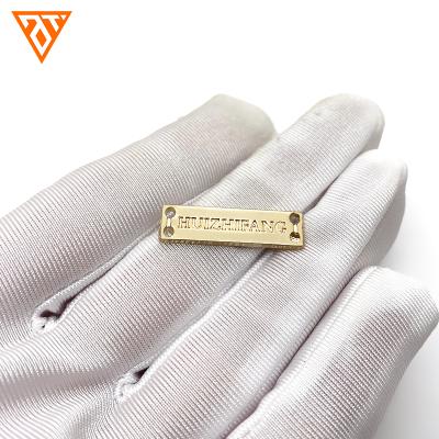 China Clothing Accessories Metal Label Logo Letters Washable Good Selling Custom Name Tag For Sweater for sale