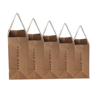 China Small Recyclable Brown Cosmetic Paper Kraft Paper Bags Christmas Eco Friendly Shopping Gift Bags Shopping Logo for sale