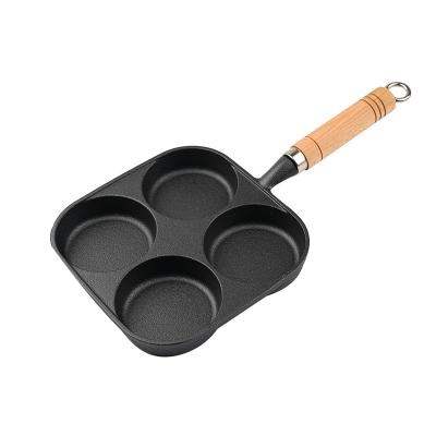 China Stocked Cast Iron Pan Thickened Four Hole Omelette Pan Household Cooking Tool Quality Assurance for sale