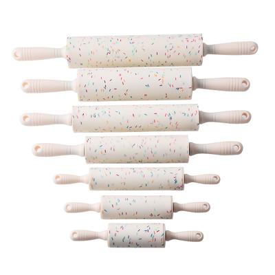 China Color Viable Particles Silicone Non-Stick Pins With Handle Plastic Pastry Tools For Kidsplastic Pin for sale