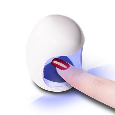 China ABS Mini Portable Nail Art Accessories Smart UV Nail Dryer Curing Gel LED Gel UV Lamp Mini Nail Dryer for sale