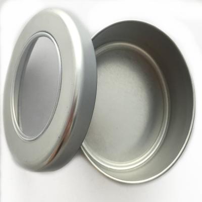 China Recycled Materials Custom Food Grade Round Tin Can Packing Mint Chocolate Candy Tea Tin Box With PVC Window for sale