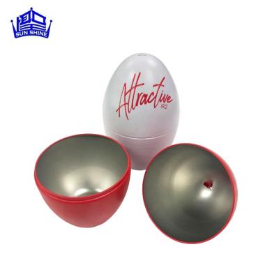 China Recycled Materials Egg Shape Tin Case Box For Easter Tin Can With Ribbon Metal Gift Box for sale