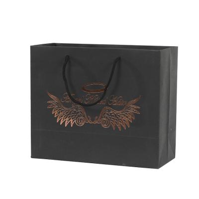 China Recyclable Wholesale Luxury Gift Custom Printed Kraft Paper Shopping Bag With Your Own Logo for sale