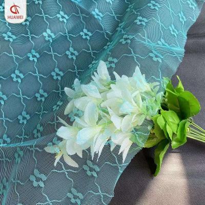 China Memory blossom jacquard polyester mosquito net fabric for sale