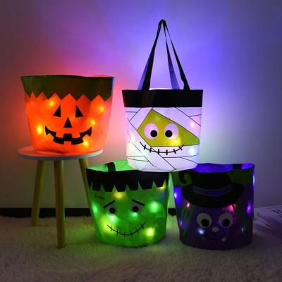 China Party Pumpkin Light Bag Top Selling Luminous LED Portable Candy Bag for Halloween for sale