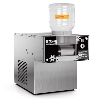 Chine Refroidissement par eau Machine de rasage de glace ménagère Broyeur de glace électrique 304 acier inoxydable à vendre