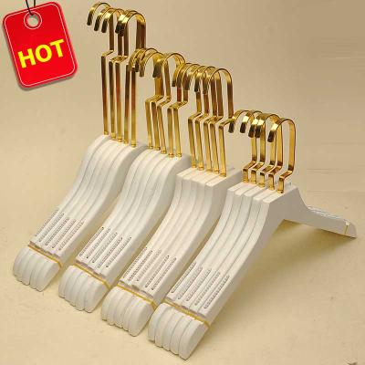 China Good Quality Durable Customized Logo Mounted Gold Flat Hook Hangers Wholesale Price Wooden Hangers for sale