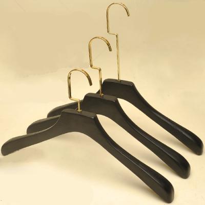 China Durable Black Velvet Personalized Wooden Coat Hangers For Clothes With Gold Metal for sale