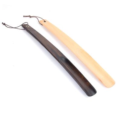 China Custom Made Wooden Lazy Black Long Black Brown Wooden Shoe Horn Furnishings Shoe Horn For Senior for sale