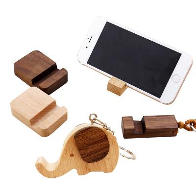 China Eco - Friendly Natural Wooden Phone Holder Key Chain Accessories 2 In 1 Wooden Keychains for sale