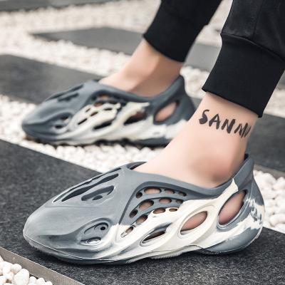 China Korean Version Fashion Camouflage Couples Hole Summer Beach Shoes Lightweight Men's Casual Women's Sandals for sale