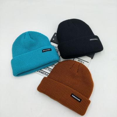 China Fashionable Custom Embroidery Logo Solid Color Warm Winter Beanie Knit Plush Hat for sale