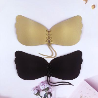 China Factory Wholesale Seamless Wing Push Up Drawstring Adhesive Silicone Strapless Invisible Bra For Women for sale