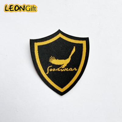 China Serviceable Sew On Patch Self Adhesive Backing Custom Embroidered Iron On Patch for sale