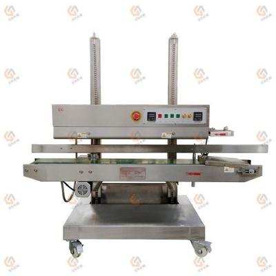 China Chemical Automatic Vertical Continuous Tape Machine Continuous Heat Sealer With Printing for sale