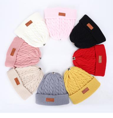 China Fashion/Warm Pom Pom Knitted Hats Autumn And Fur Warm/Comfortable Kids Removable Winter Knit Hat Custom Logo for sale