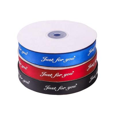 China Custom Logo Floral Printed 2.5CM Wide Woven Ribbon In Rolls for sale