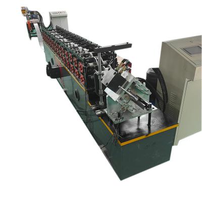 China Construction worksÂ   Automatic Omega Profile Roll Forming Machine Steel C Channel Roll Forming Machine For Metal Tile Making Machinery for sale