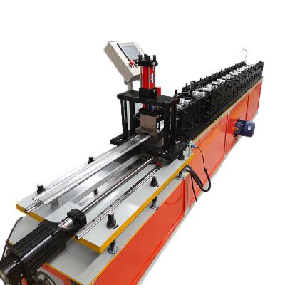 China Construction worksÂ   High Quality Steel Rolling Shutter Door Strip Roll Forming Machine Profile Customized for sale