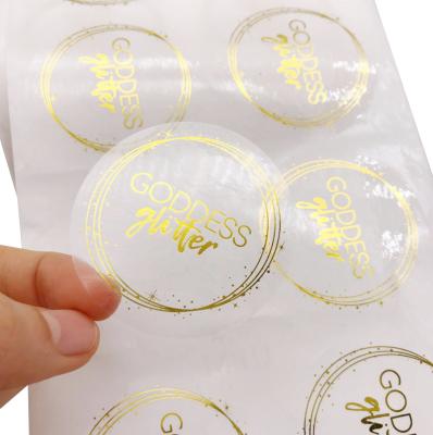 China Waterproof Custom Printing in Clear Gold Foil Vinyl Hot Stamping Waterproof Transparent Labels Sticker for sale