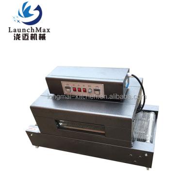 China Industrial Black Plastic Food Table Top Cardboard Beverage Food Wrapping Heat Shrink Tunnel Machine for sale