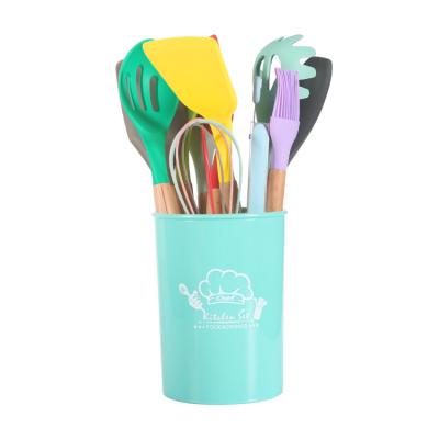 China Best Quality Viable Colorful Modern Silicone Wooden Handle Kitchenware Tool Kit for sale