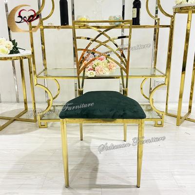 China Removable green velvet cushion cross back stainless steel gold wedding chair for sale