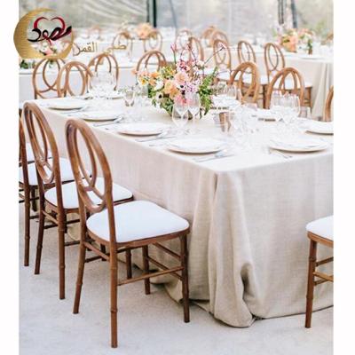 China Banquet furniture X back colorful bulk bamboo used chiavari chair for sale Te koop