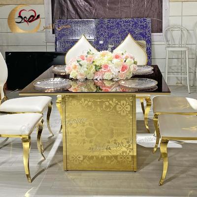 China LED glowing stainless steel metal golden glass tables for wedding and party for sale