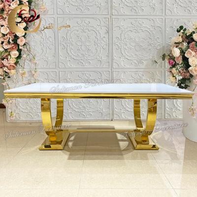 China Foshan Hotel new arrival gold stainless steel base white glass top event tables for weddings for sale